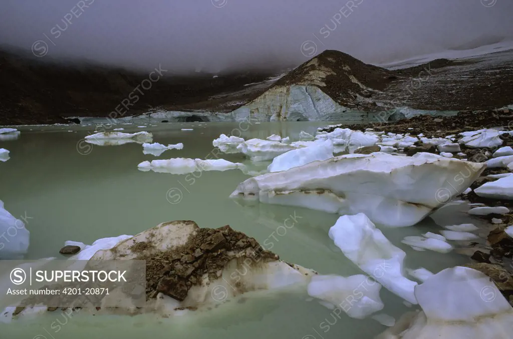Ice on lake beneath Mt Edith Cavell, Jasper National Park, Alberta, Canada