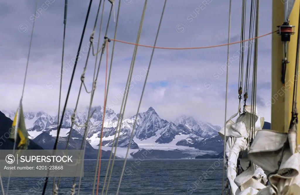 View of snow covered mountains from sailboat, South Georgia Island