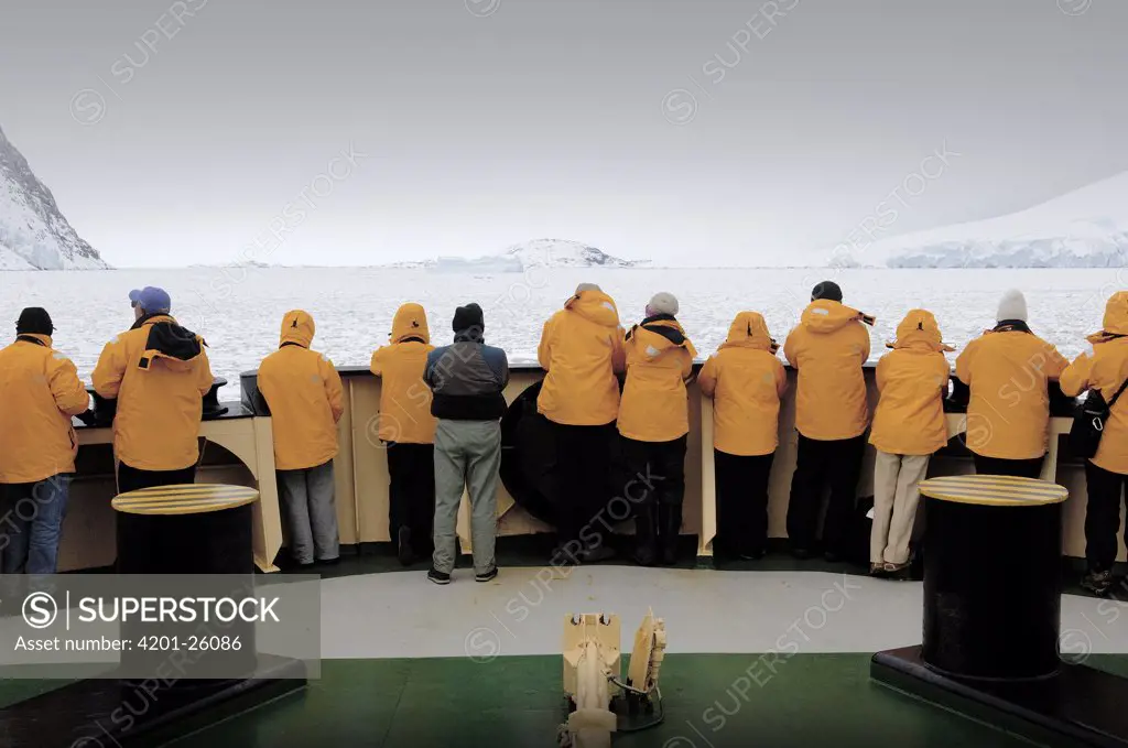 Tourists on bow of Russian icebreaker Kapitan Khlebnikov, Antarctica