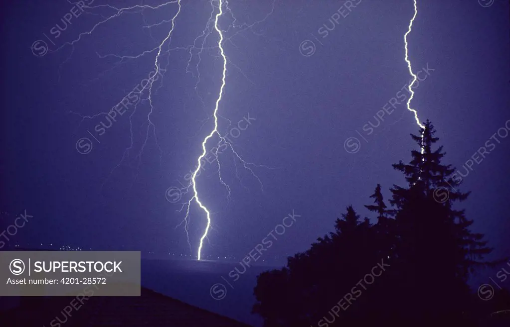 Lightning over city, England