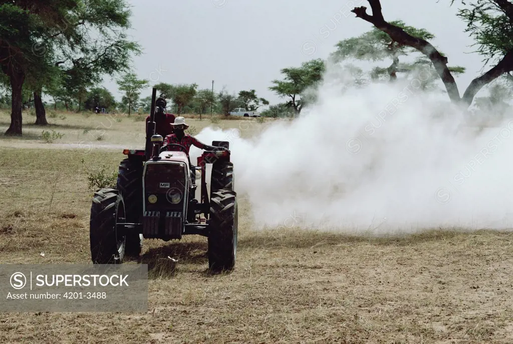 Farmer spraying for Locust, South Africa