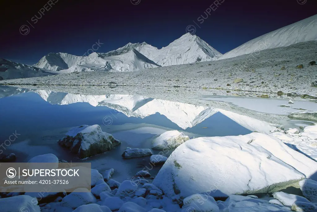 Mt Everest reflected in pond at 6,000 meters elevation, Kharta Glacier, Tibet