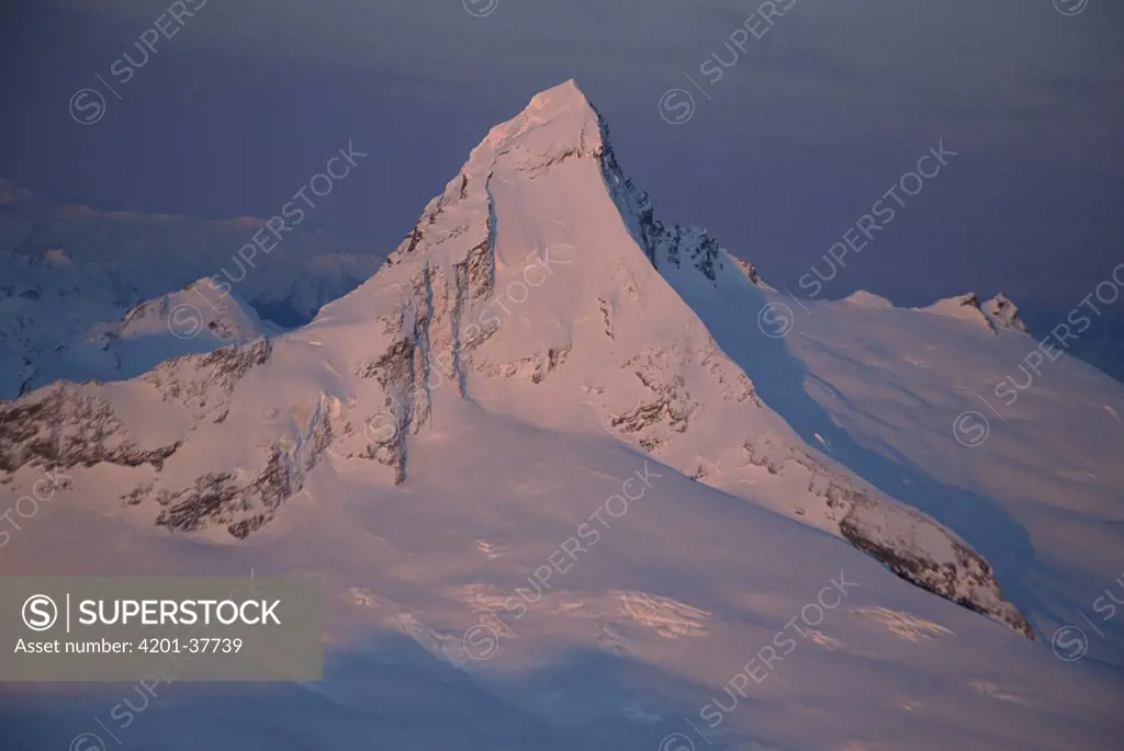 Aerial view of Mt Aspiring (3033 meters) at sunset, winter, New Zealand