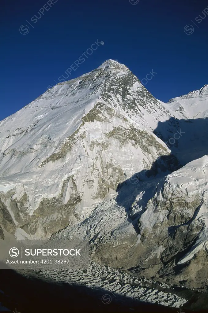 Moon over summit of Mount Everest and Khumbu Glacier, Sagarmatha National Park, Nepal
