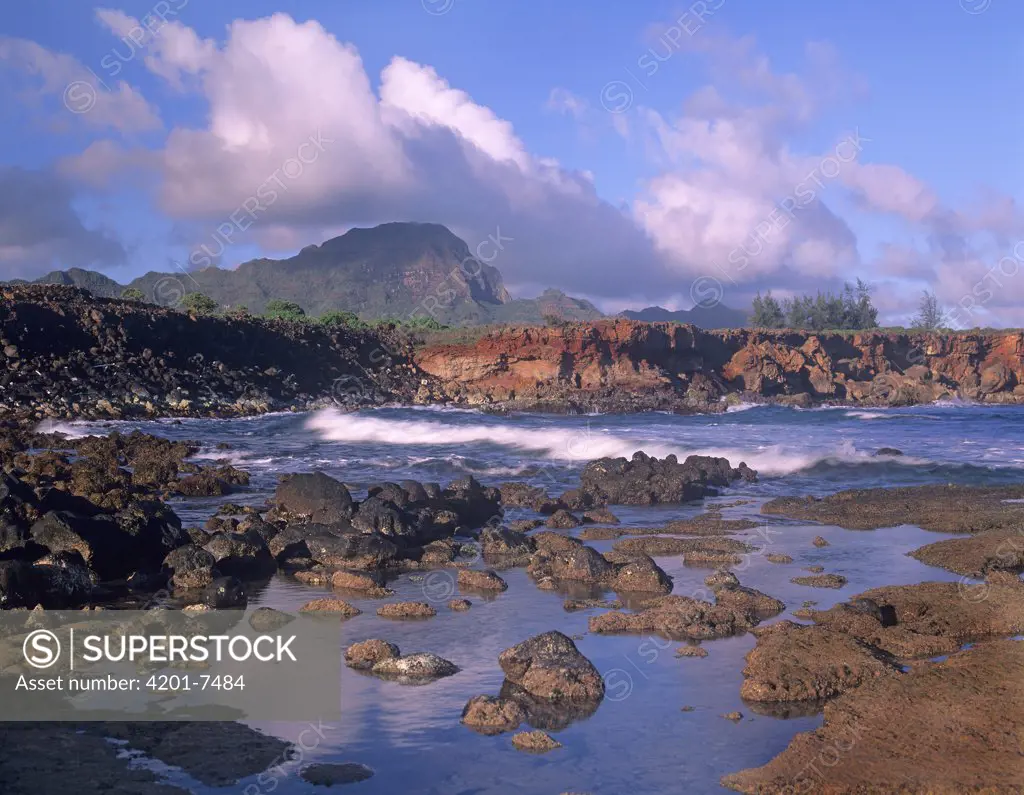 Rocky shore and cliffs at Shipwreck Beach, south shore of Kauai, Hawaii