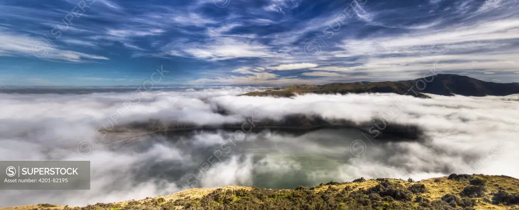 Lake Forsyth shrouded in clouds, Banks Peninsula, Canterbury, New Zealand