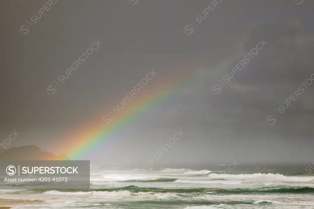 Rainbow over ocean, Great Ocean Road, Port Campbell National Park, Victoria, Australia