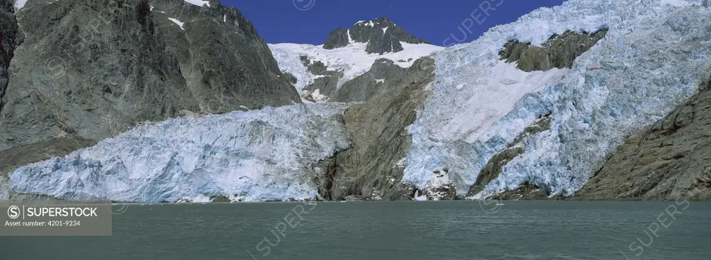 Northwestern Glacier spills out of the Harding Ice field into the ocean, Kenai Fjords National Park, Alaska