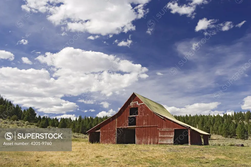 Old red barn in pastoral landscape, Oregon