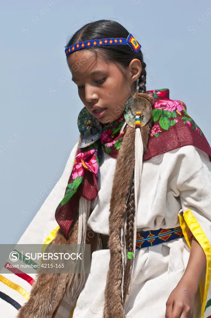 First Nations girl in traditional dress, Blackfoot Crossing Historical Park, Alberta, Canada