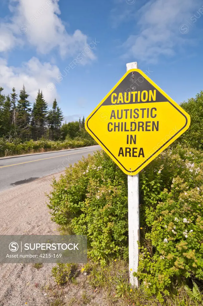 Warning sign reading the message 'Caution Autistic Children in Area', Elliston, Bonavista Peninsula, Newfoundland and Labrador, Canada