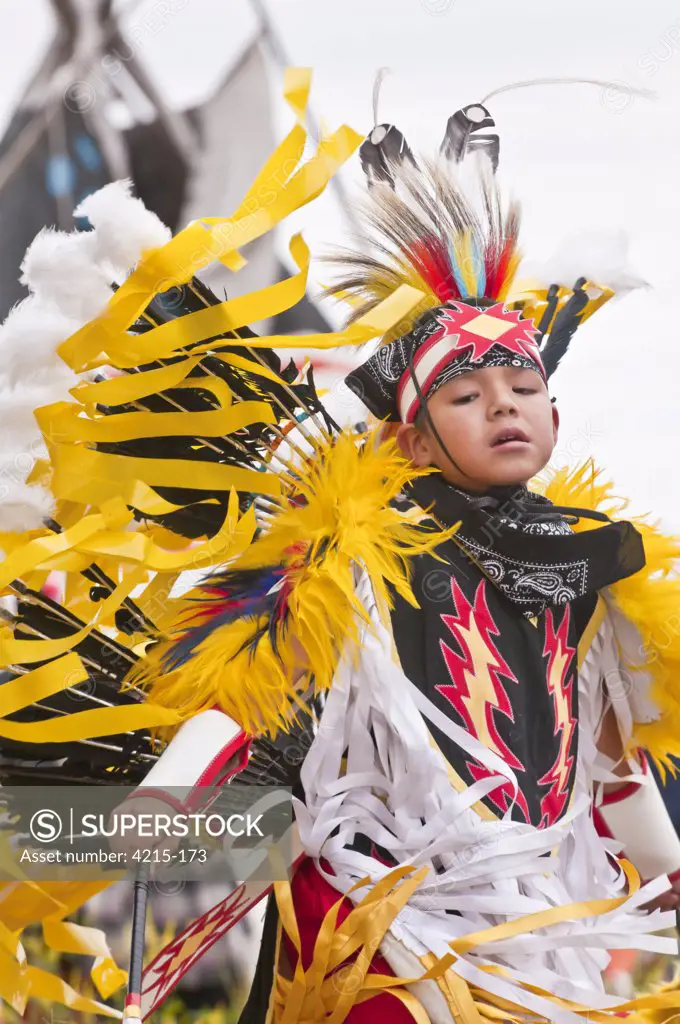 First Nations boy in traditional dress, Blackfoot Crossing Historical Park, Alberta, Canada