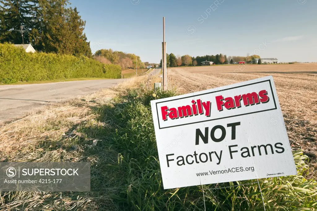 Signboard saying 'Family Farms Not Factory Farms' message at a farm, Viroqua, Wisconsin, USA