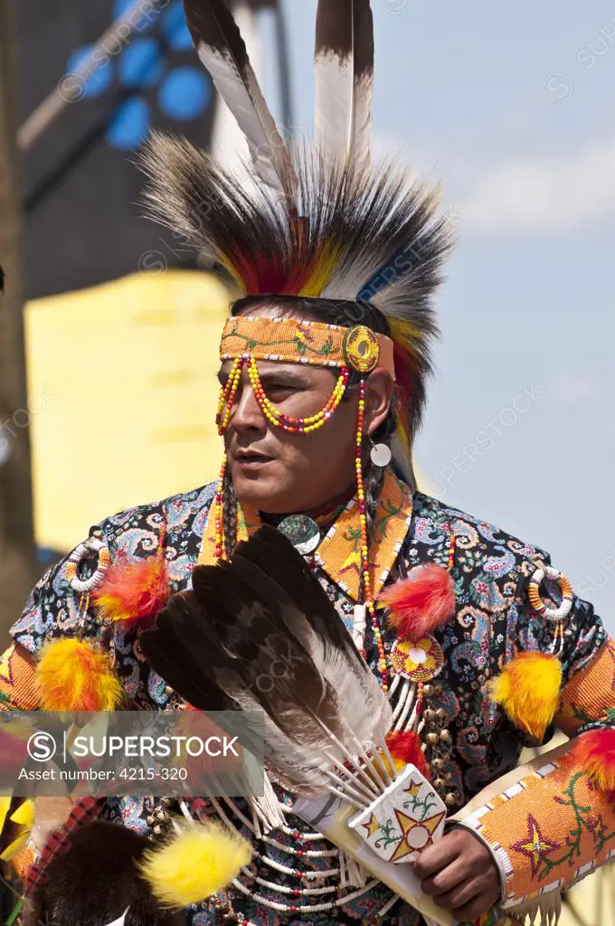 Adult male dancer in traditional regalia in 2nd Annual World Chicken Dance Championships, Blackfoot Crossing Historical Park, Alberta, Canada
