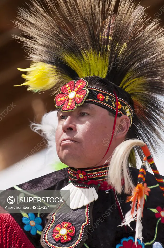 Male dancer in traditional regalia in 2nd Annual World Chicken Dance Championships, Blackfoot Crossing Historical Park, Alberta, Canada