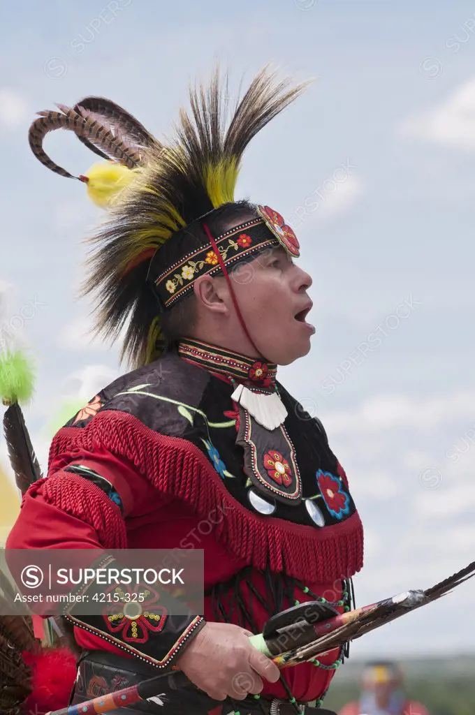 Male dancer in traditional regalia in 2nd Annual World Chicken Dance Championships, Blackfoot Crossing Historical Park, Alberta, Canada