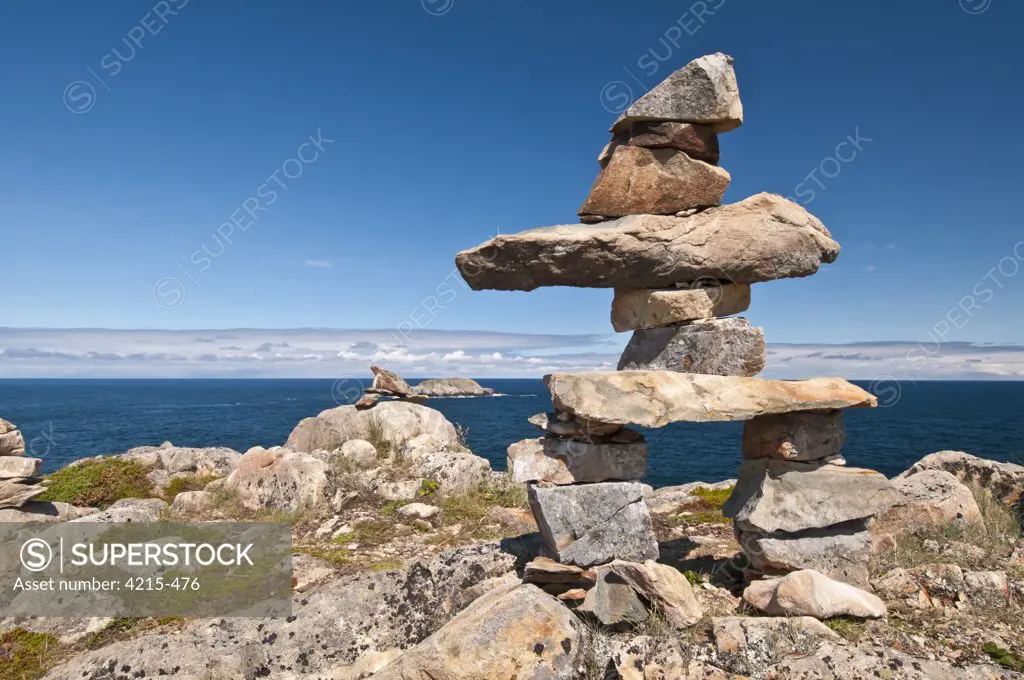 Inukshuk at a coast, Cape Bonavista, Bonavista Peninsula, Newfoundland, Canada