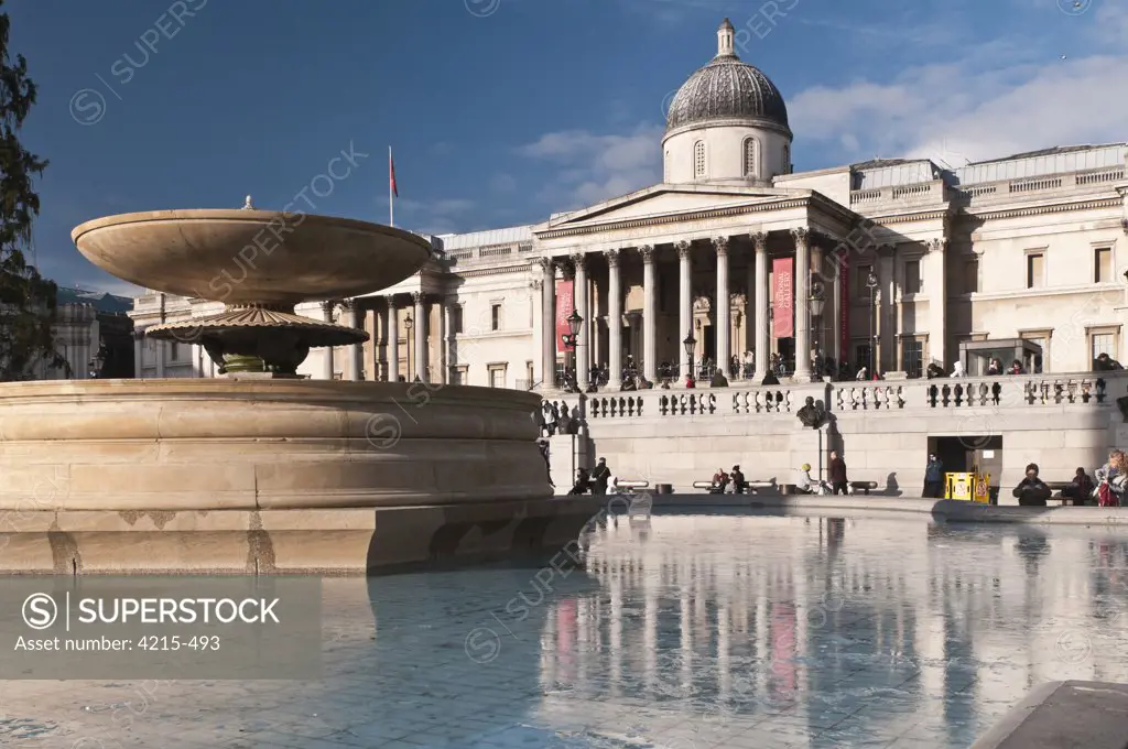 Fountain in front of a museum in winter, National Gallery, Trafalgar Square, City Of Westminster, London, England