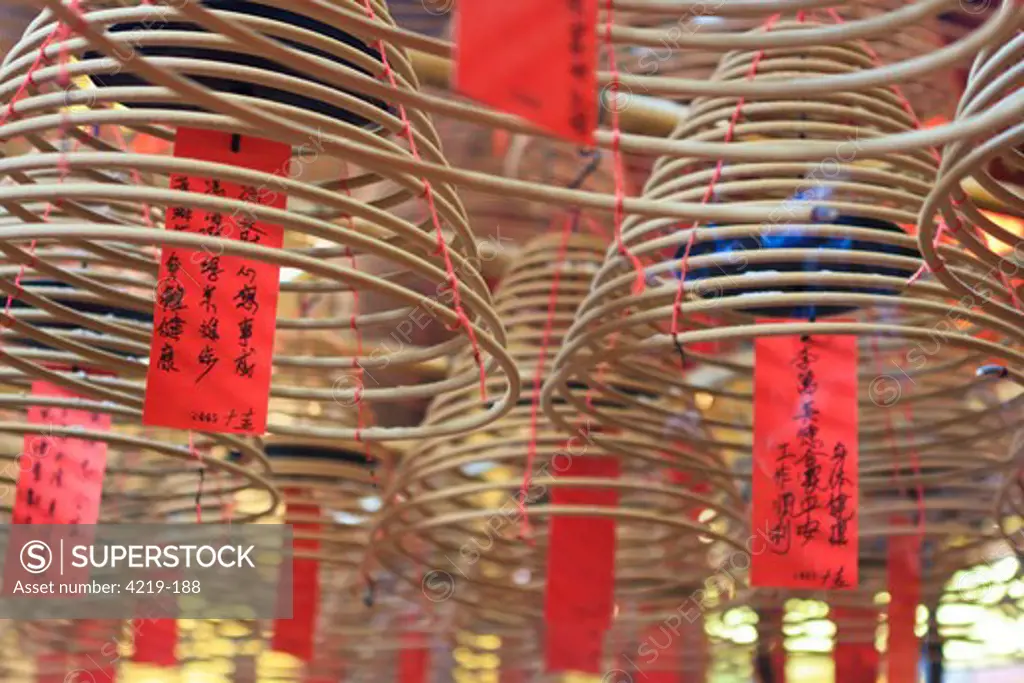 China, Hong Kong, Hollywood Road, Incense coils hang from roof in Man Mo Temple