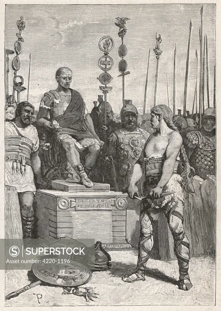 The leader of the Gauls,  Vercingetorix, lays his arms  before Caesar.
