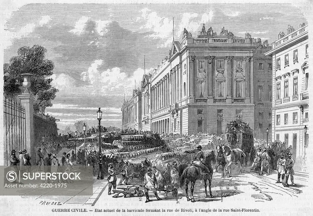 The massive barricade  constructed at the junction of  the rue de Rivoli with the  place de la Concorde.