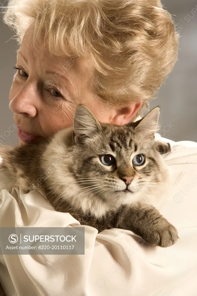 Woman - holding cat 