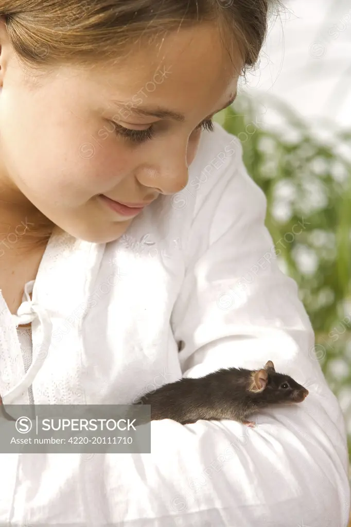 Girl - with pet rat on arm 