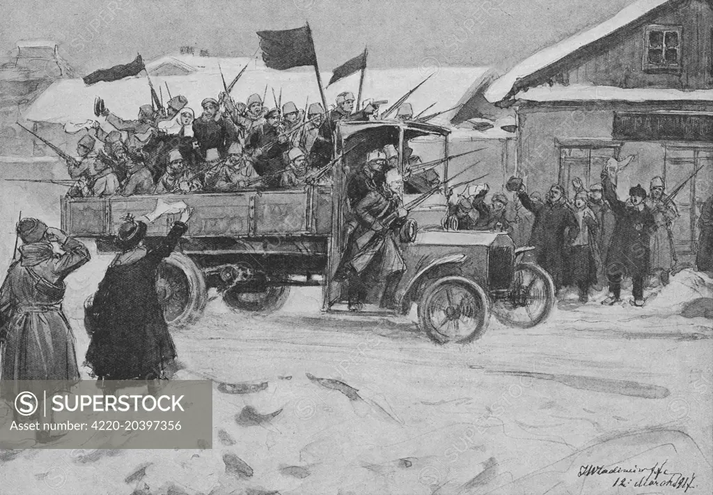 A truckload of Red Guards  drive through the streets of  Petrograd, acclaimed by the  populace.       Date: October 1917