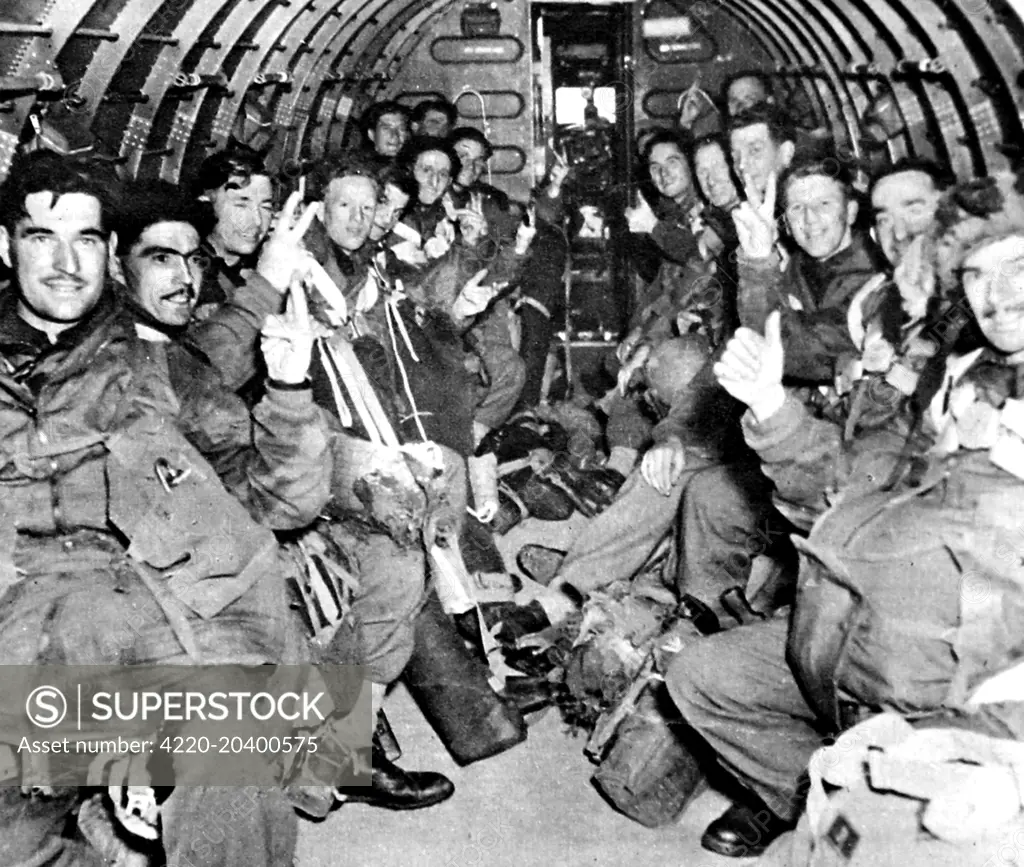 Photograph showing a unit of the British First Airborne Division in a glider on the way to Arnhem, September 1944.    On 17th September 1944 Operation 'Market Garden' was put into action; a bold plan devised by Field-Marshal Montgomery to drop thousands of airborne troops into Holland to capture an invasion route into Germany.  The British First Airborne, American 81st and 101st Divisions took part in the plan, which was ultimately unsuccessful.     Date: 1944