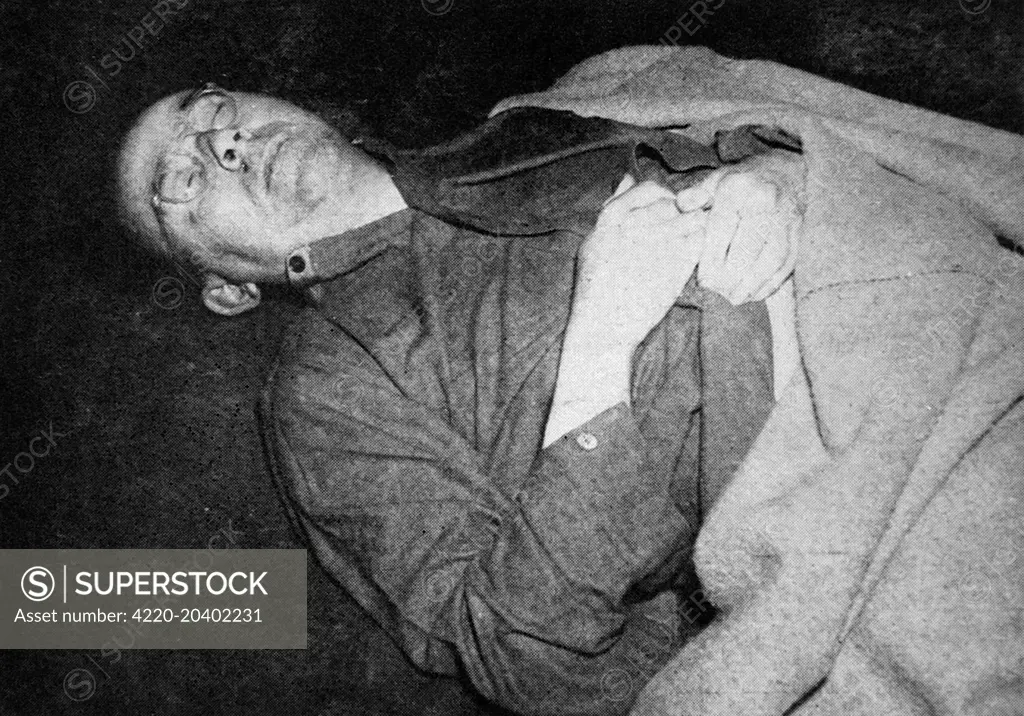 Photograph showing the corpse of Heinrich Himmler (1900-1945), the German Nazi leader and Chief-of-Police, shortly after he committed suicide at a Luneburg villa in May 1945.      He is shown wearing British Army clothing, which had been issued to him when he was captured.     Date: 1945