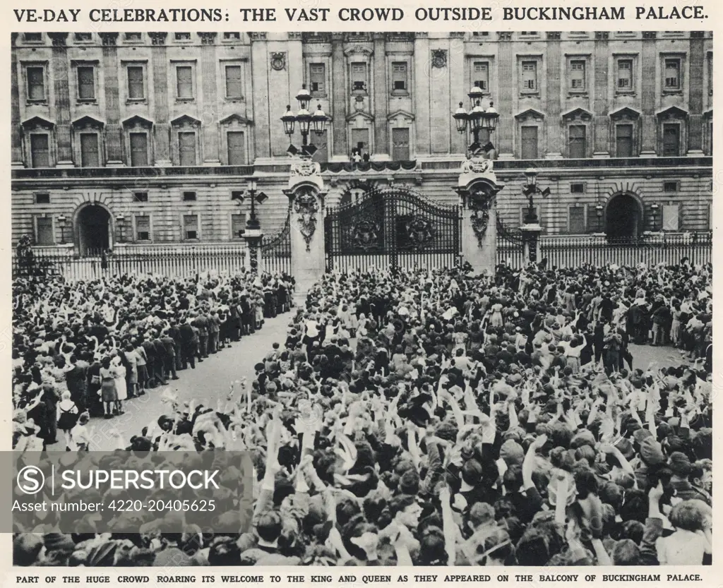 Crowds seen cheering and waving outside the gates of Buckingham Palace on May 8th 1945 (VE Day).  George V and Queen Mary with Princeses Elizabeth and Margaret can be seen at a distance acknowledging the crowds from the Buckingham Palace balcony.    They were later joined by Winston Churchill.  19 May 1945
