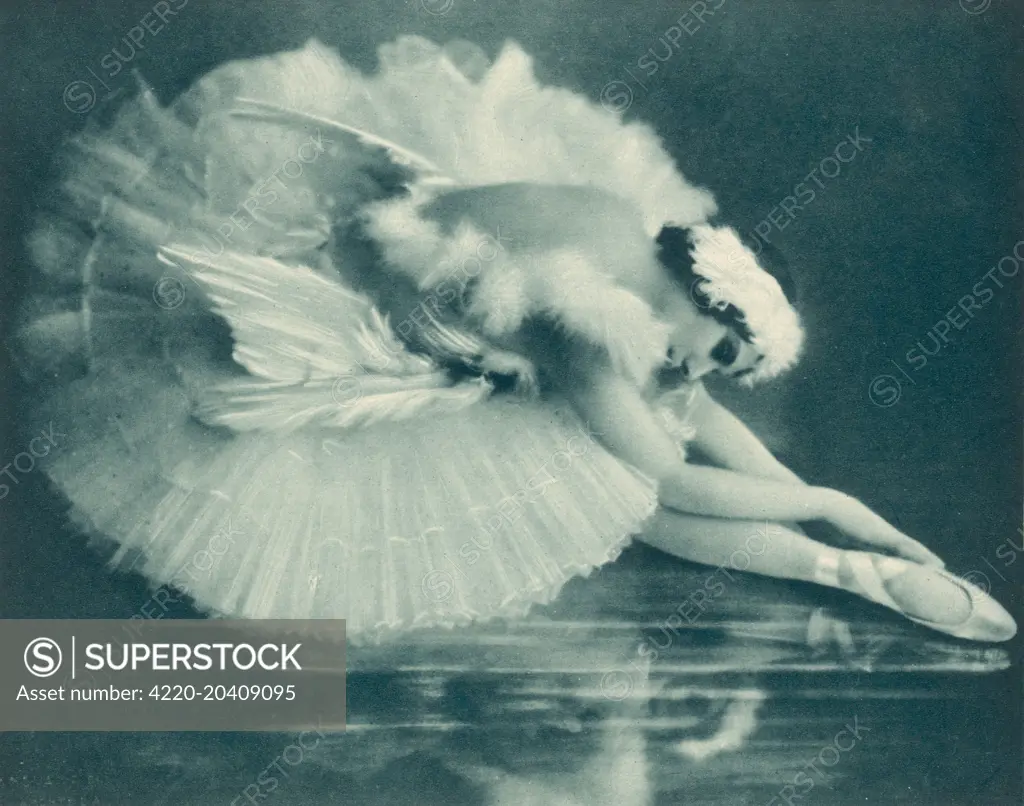 Anna Pavlova (1881-1931) Russian ballet dancer photographed here in Swan Lake in 1920.   1920