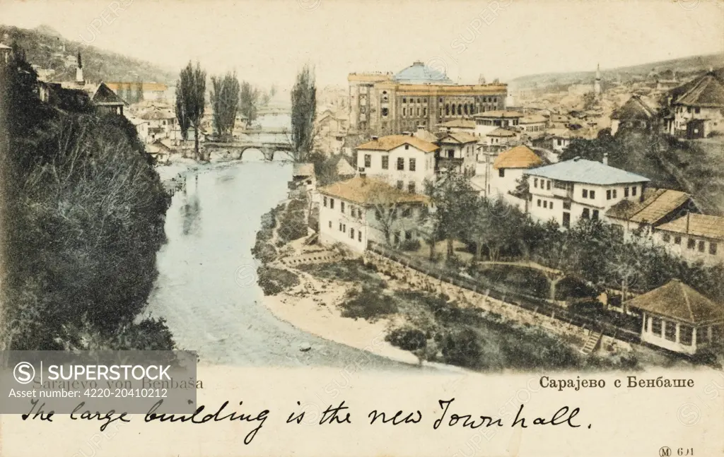 A view of Sarajevo, the capital of Bosnia and Herzegovina, showing the New Town Hall, River Miljacka and one of the city's bridges across the river.     Date: 1902