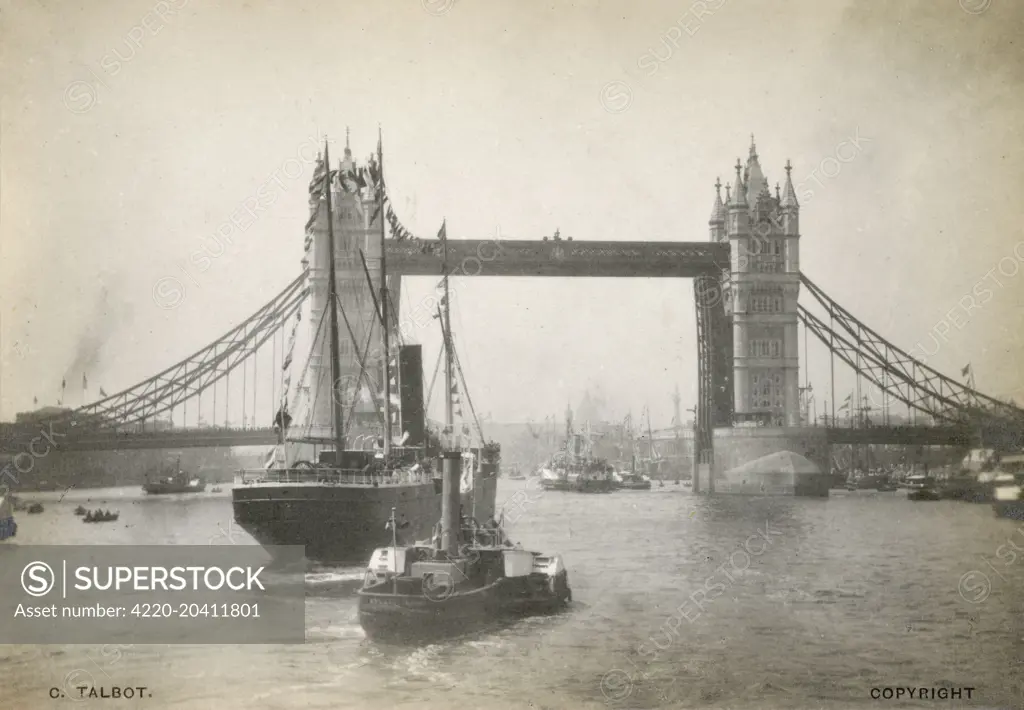 Ships on the River Thames by Tower Bridge in London, England