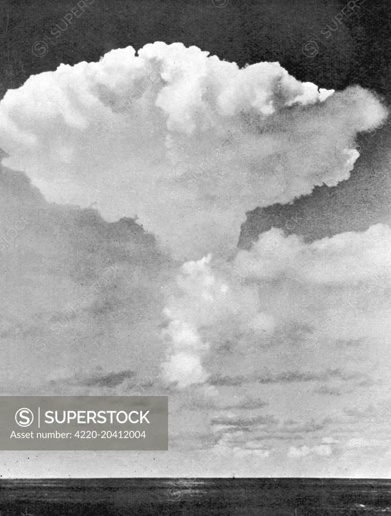 Britain's first hydrogen bomb test over the Pacific, 1957. The mushroom cloud at a late stage of its development: the base of the column is still well clear of the sea.  15th May 1957