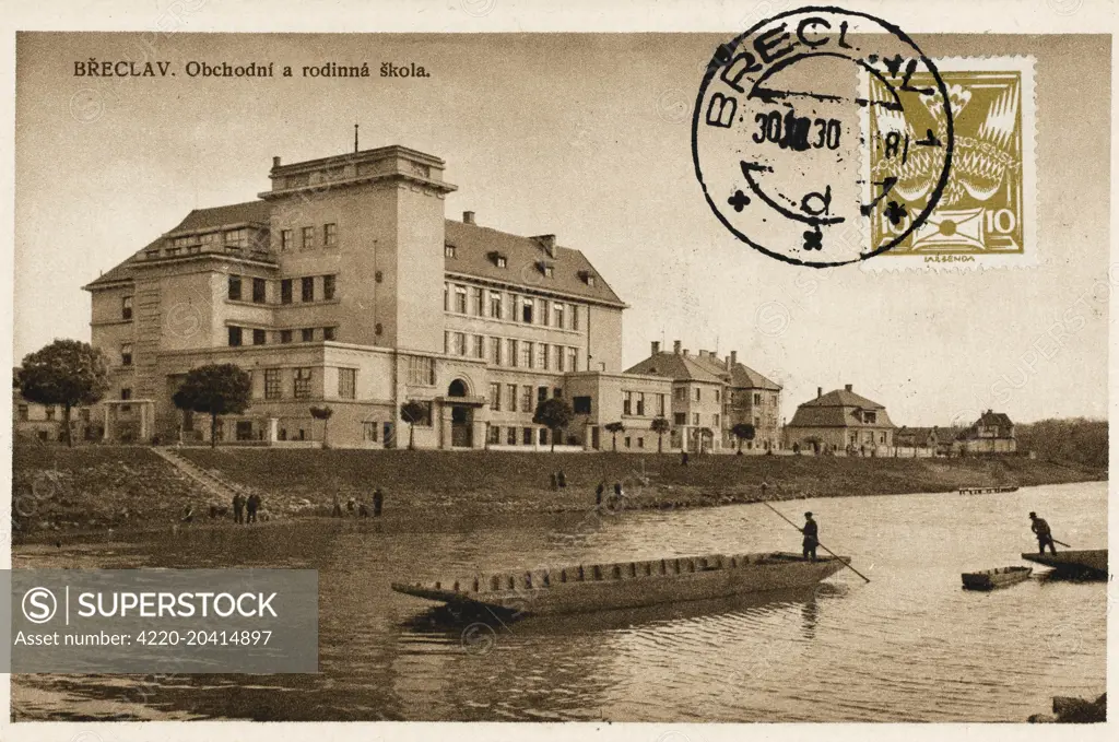Breclav - a town in the South Moravian Region, Czech Republic, on the border with Lower Austria on Dyje River (pictured). This card shows the The Business Academy of Breclav, still going strong 79 years after this card was sent!     Date: 1930