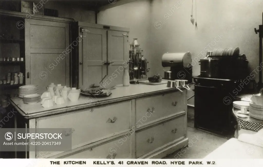 A restaurant kitchen in the late 1930s - at 'Kelly's', 41 Craven Road, Hyde Park, W2, London     Date: 1937
