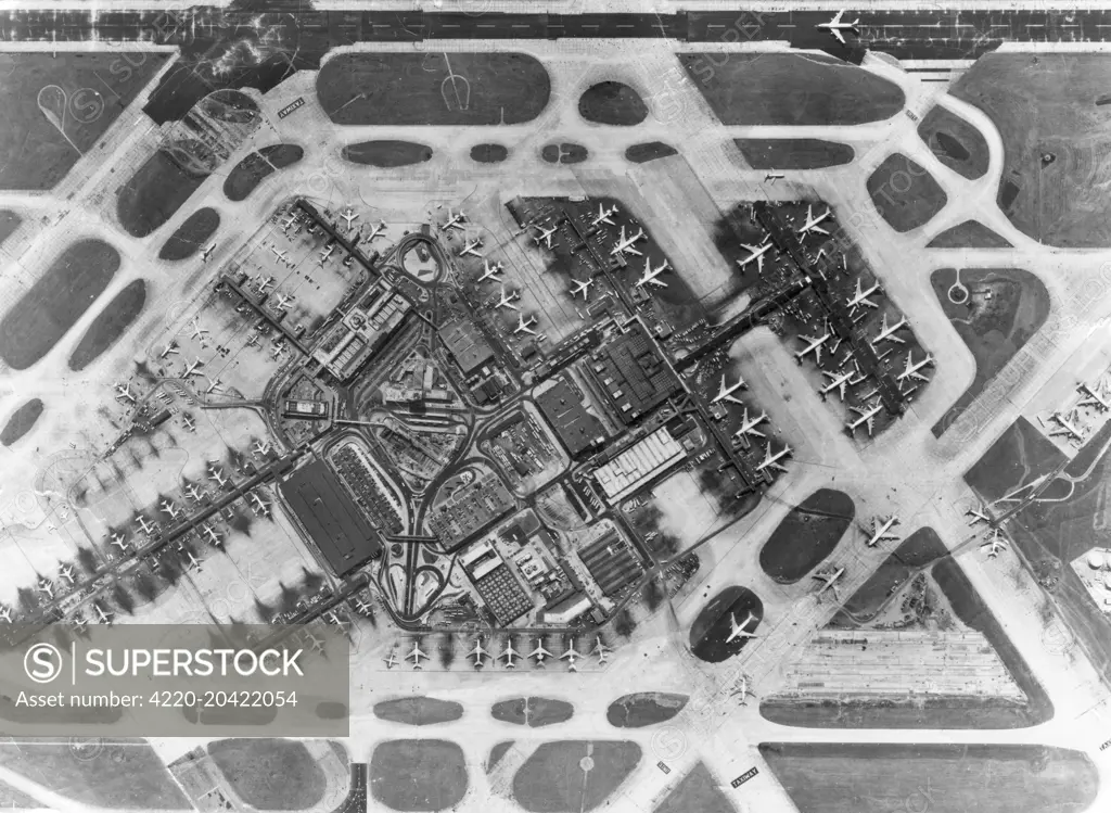 A spectaclar aerial view of the terminals, taxiways ans runways of LAX Airport, Los Angeles, USA - now extensively re-modelled.     Date: circa 1970