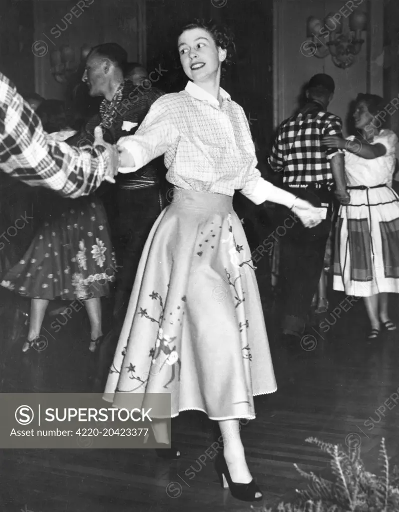 Princess Elizabeth (Queen Elizabeth II) dancing a Canadian Square Dance at Government House, Ottawa during he Royal Tour of 1951.     Date: 1951