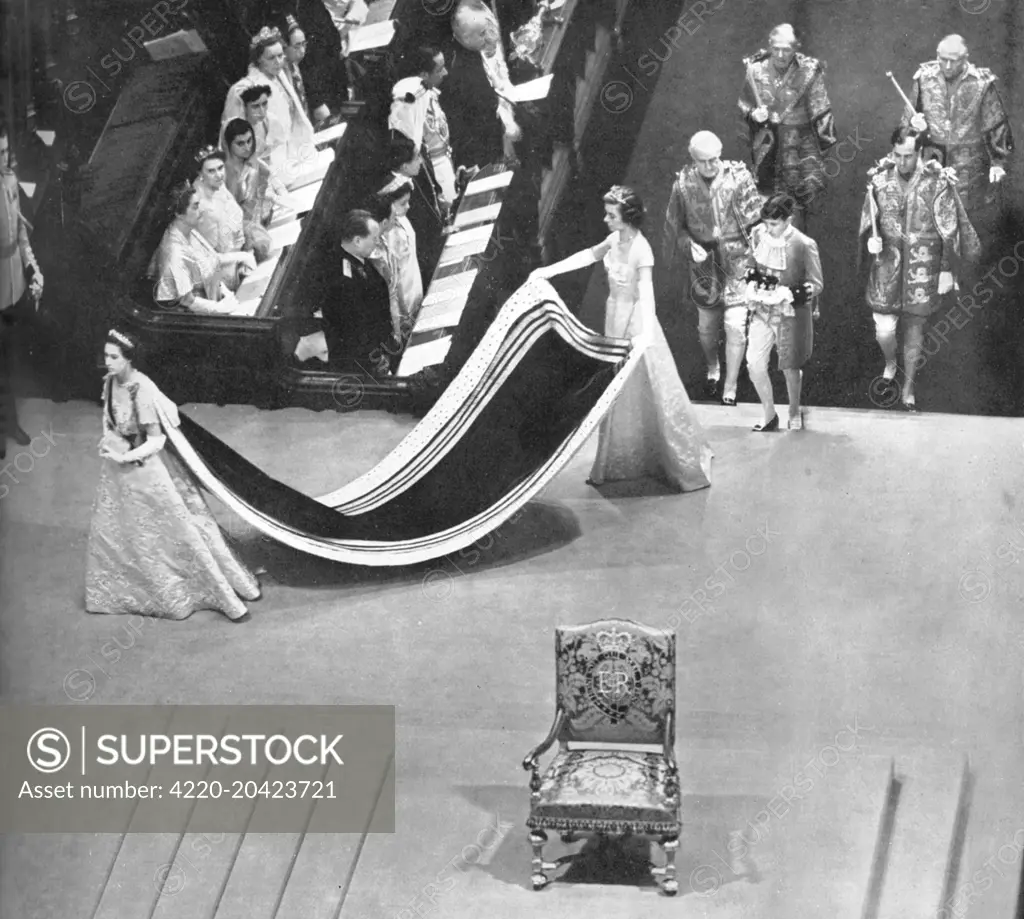 The sister of Queen Elizabeth II, Princess Margaret,  enters the Coronation Theatre in Westminster Abbey. Her train is carried by Miss Iris Peake, and she is followed by her page, Albemarle Bowes Lyon, who carries her coronet. Behind him are the Heralds of Richmond, York, Chester and Lancaster. In the foreground is the Throne.     Date: 1953