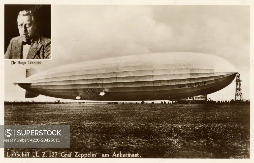 Graf Zeppelin - LZ 127 - at anchor. The inset portrait shows Dr. Hugo Eckener (1868-1954), the manager of the Luftschiffbau Zeppelin during the inter-war years, and was commander of the famous Graf Zeppelin for most of its record-setting flights, including the first airship flight around the world.     Date: circa 1934