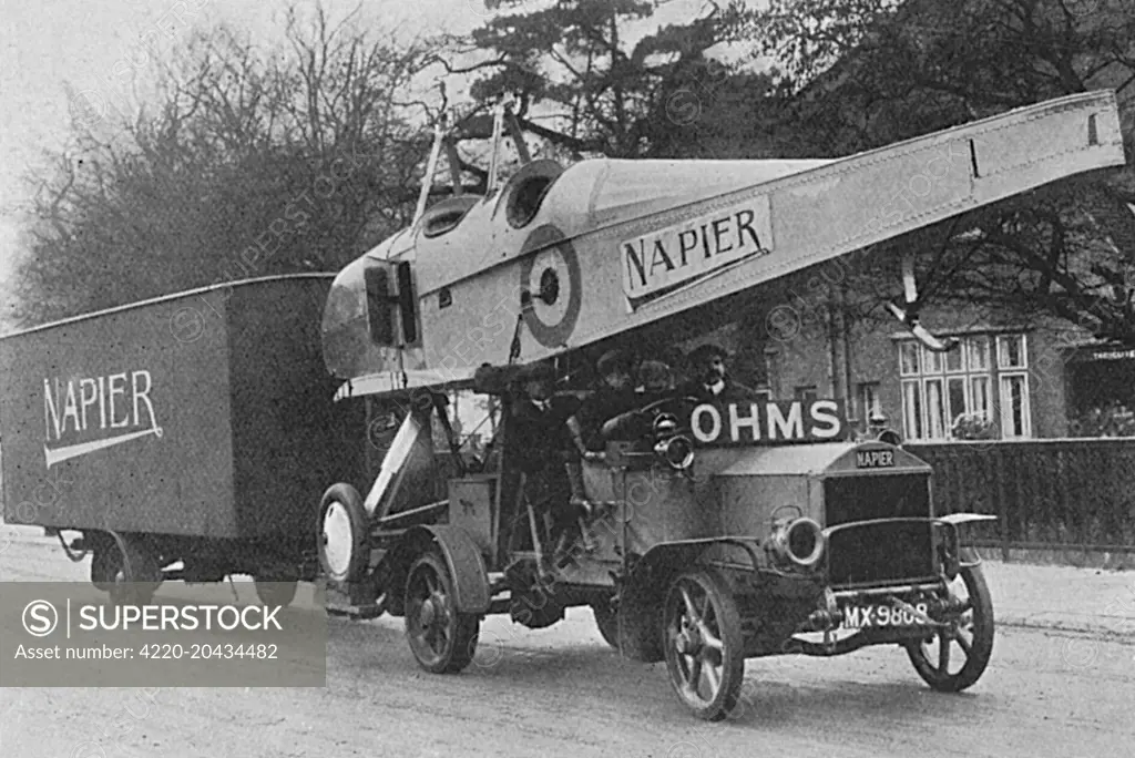A Napier aeroplane en route to the army authorities, towed by a car with a large trailer.       Date: 1916