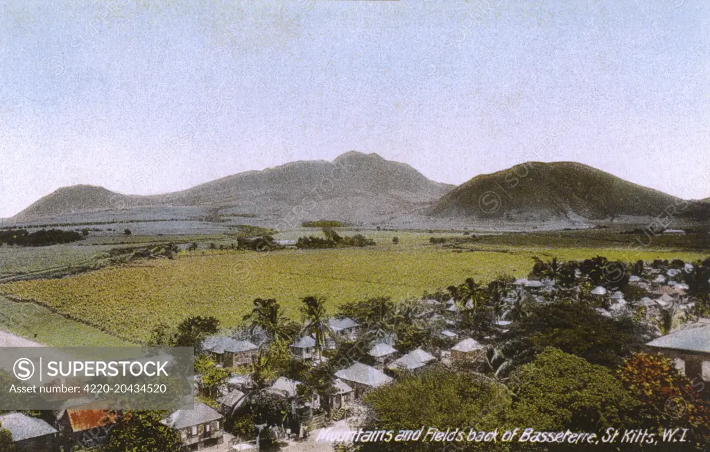St. Kitts, West Indies - Mountains and fields behind Basseterre     Date: circa 1905