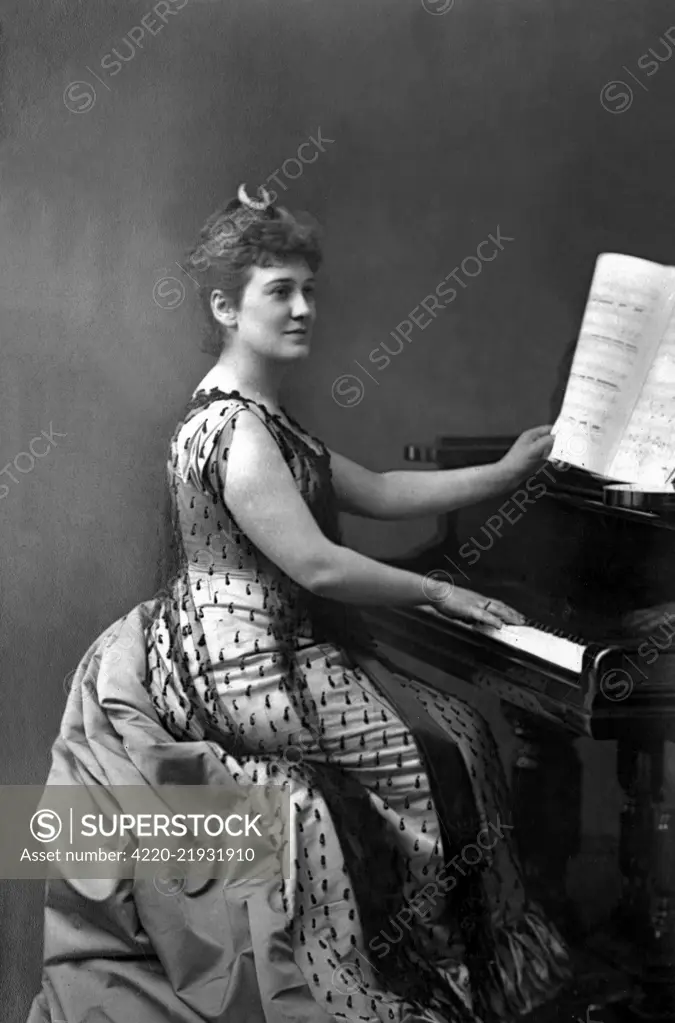 Lilian Norton Nordica (1857-1914), American opera singer (soprano) at the piano.     Date: 1890