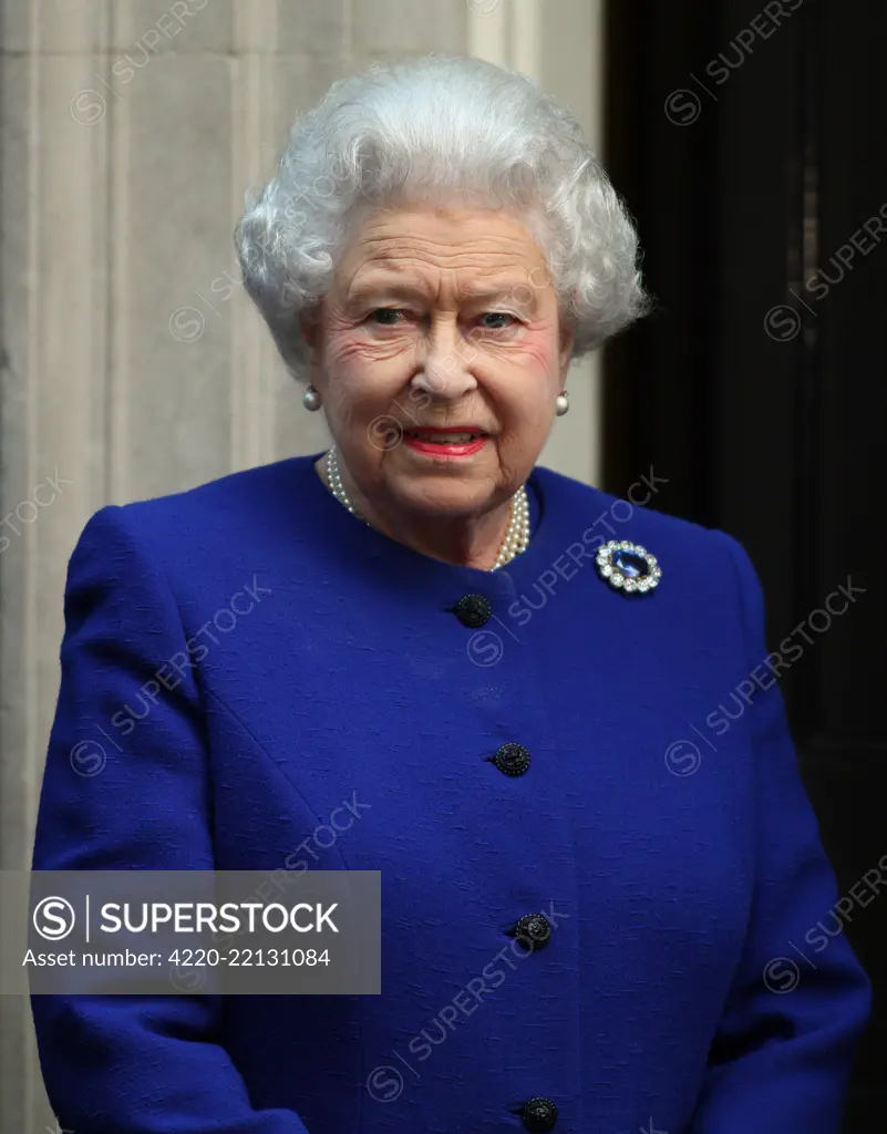Queen Elizabeth II during a Royal Visit to Number 10 Downing Street, London, where she received a gift to mark the Diamond Jubilee and attended a Cabinet meeting as an observer. 18 December 2012