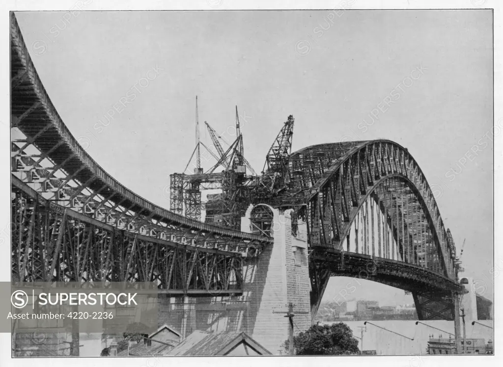 The Sydney Harbour bridgenearing completion : at thetime of its opening, it is thelargest suspension bridge inthe world. Date: 1931