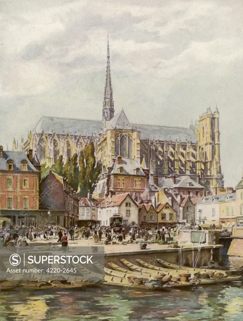 The cathedral seen fromacross the river Somme Date: circa 1910