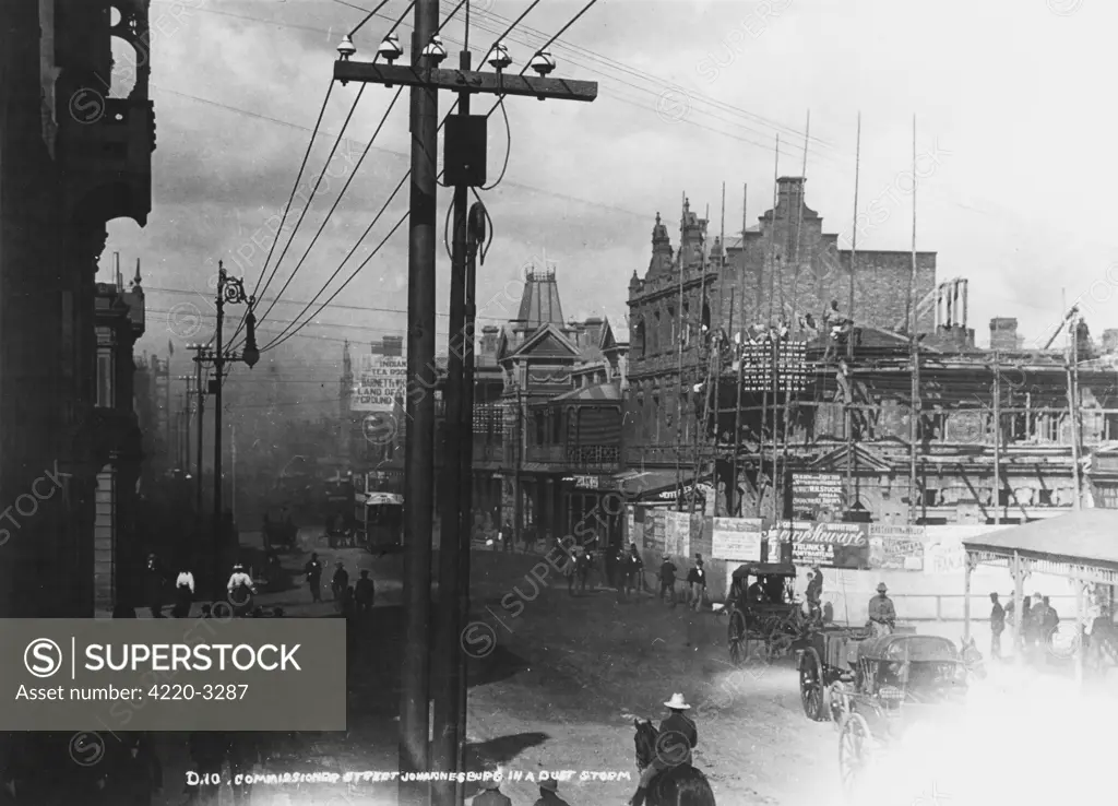 Commissioner Street during adust storm. Date: circa 1897