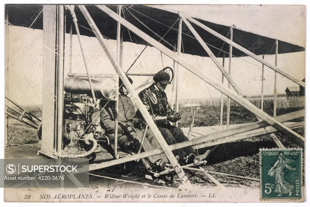 With the Comte de Lambert, at  the controls of one of his  biplanes, at a French aviation  meeting - possibly at Pau       Date: 1909