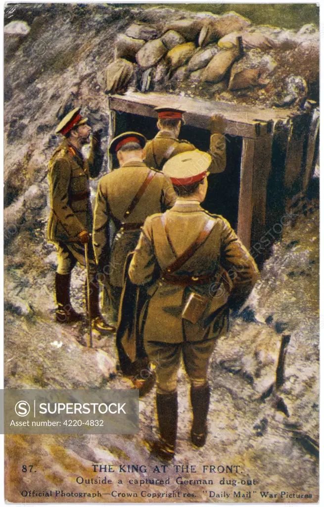GEORGE V  Visiting a captured German  dug-out during the First World War